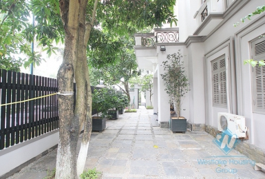 Spacious house with large courtyard for rent in Ciputra Compound, Tay Ho District, Ha Noi.